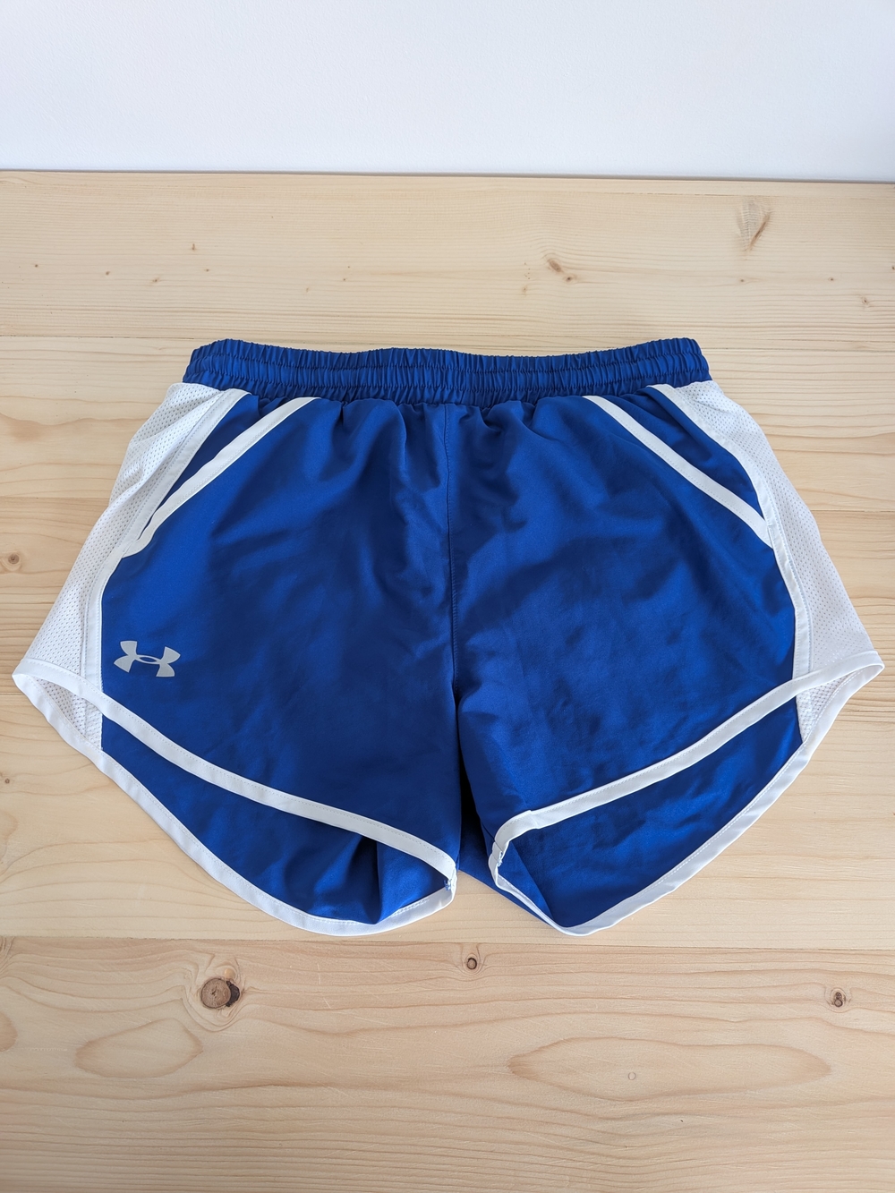 Under Armour Women's Blue Athletic Shorts with White Accents